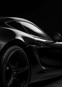 close-up-front-view-of-black-sports-car-with-copy-space-generative-ai-photo